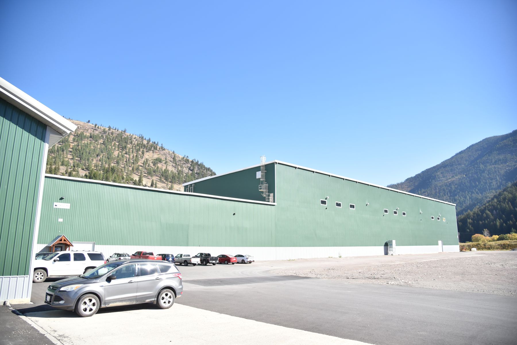 Big Sky Fulfillment's warehouse in Bonner, Montana, with mountains behind it