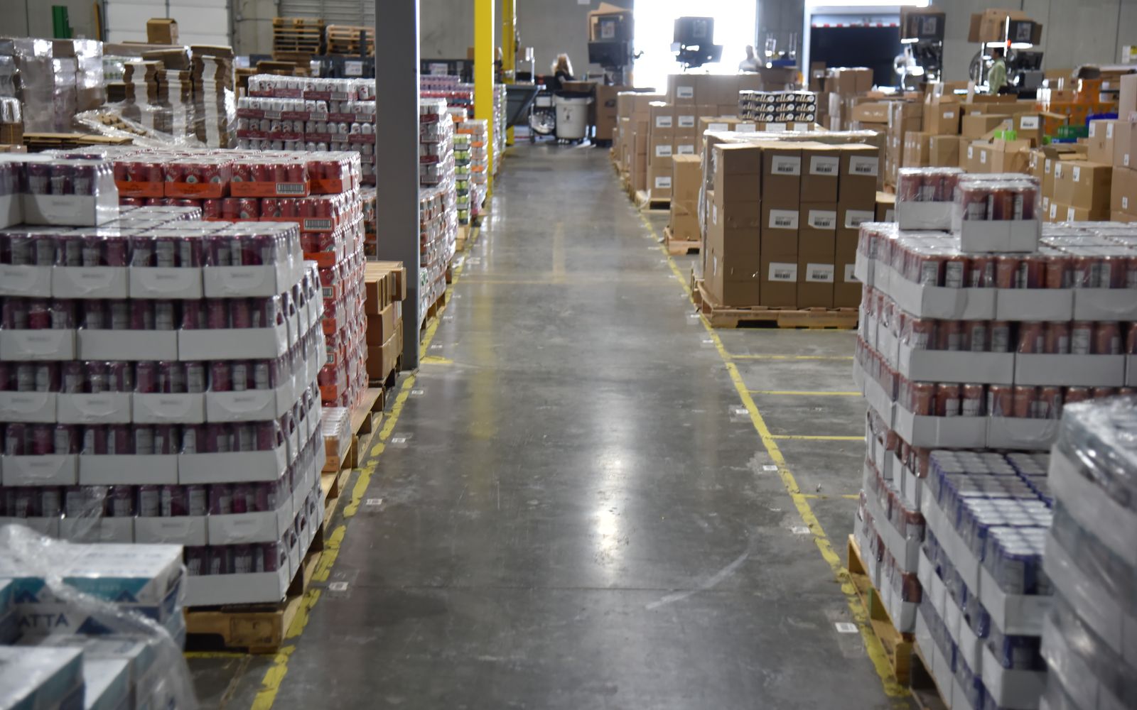 Aisle of food and beverage pallets in a Big Sky Fulfillment warehouse